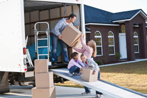 family loading moving truck rental